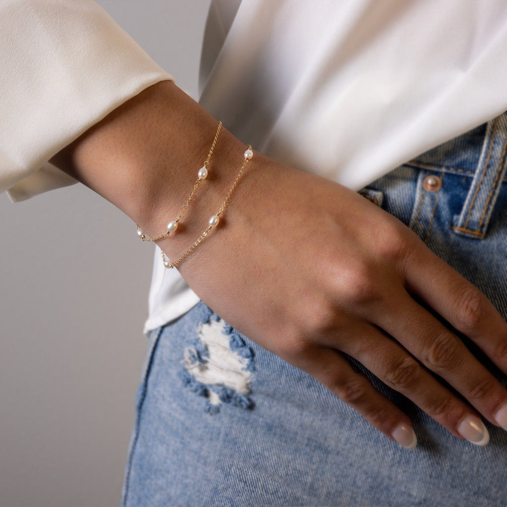 a close up of a person wearing a bracelet