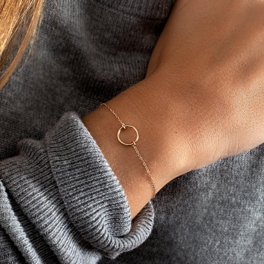 a close up of a person wearing a bracelet