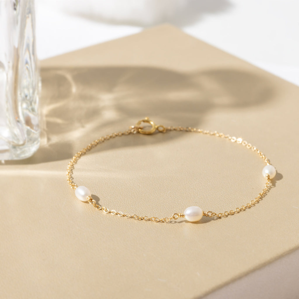 a close up of a bracelet on a table