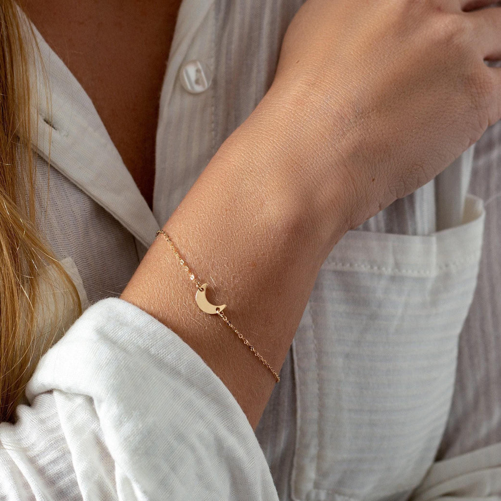 a close up of a person wearing a bracelet